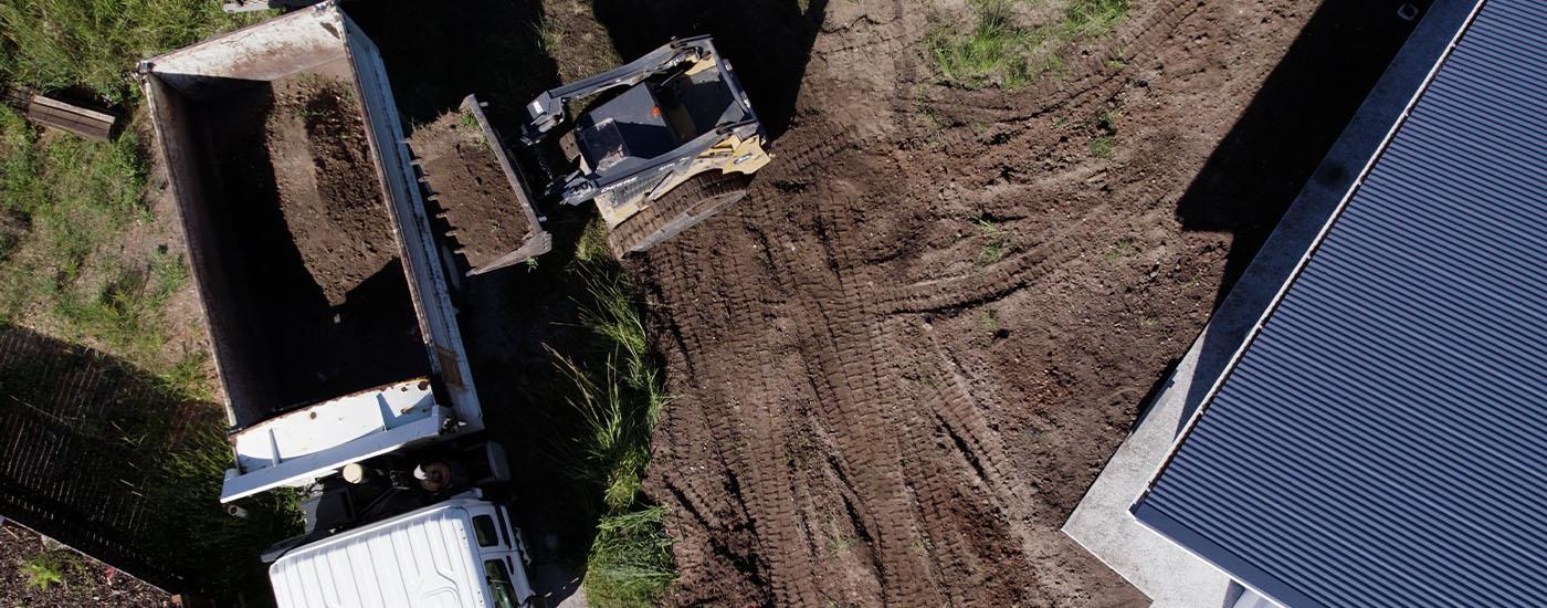 Construction site waste removal in progress